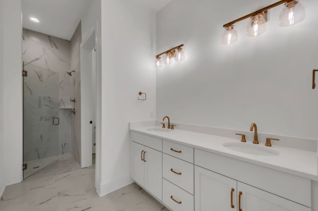 bathroom with a shower with door and vanity