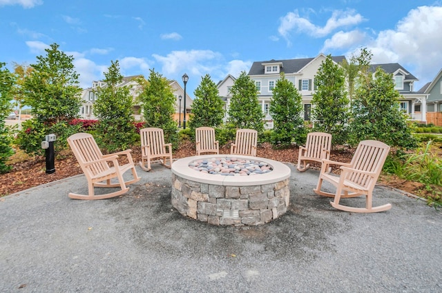 view of patio with an outdoor fire pit