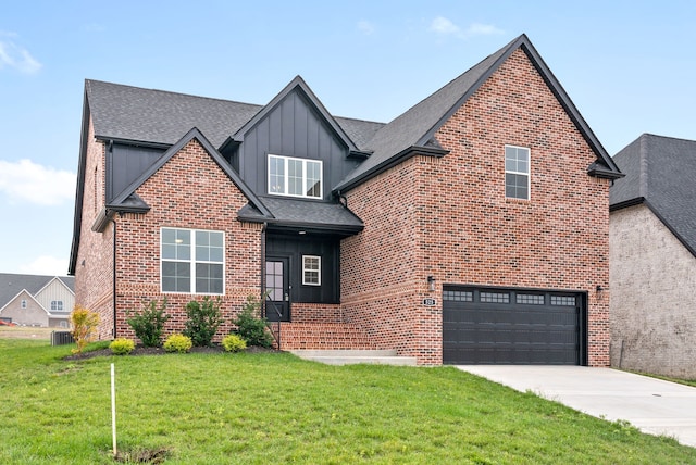 view of front of property featuring cooling unit, a front lawn, and a garage