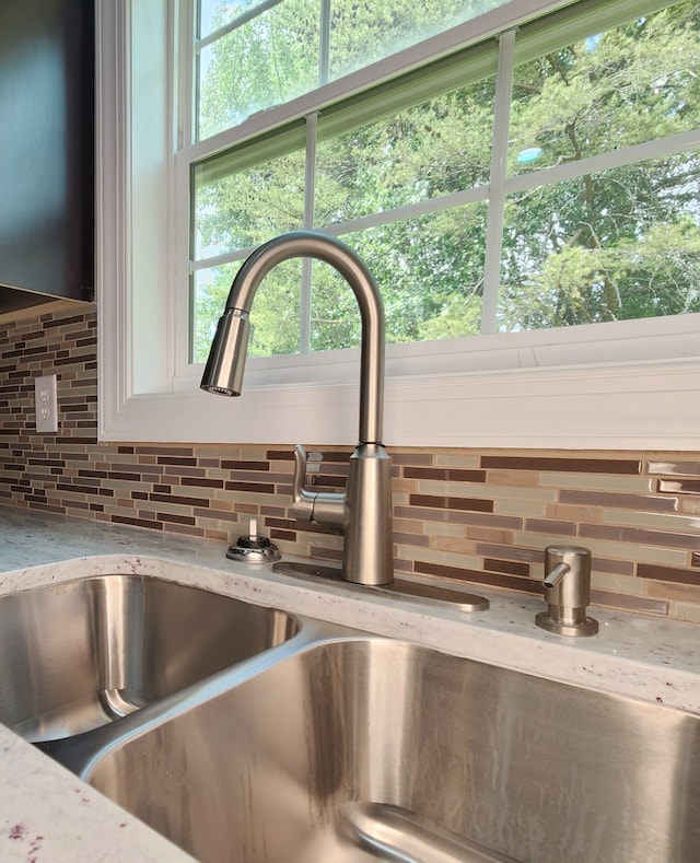 details with tasteful backsplash and sink