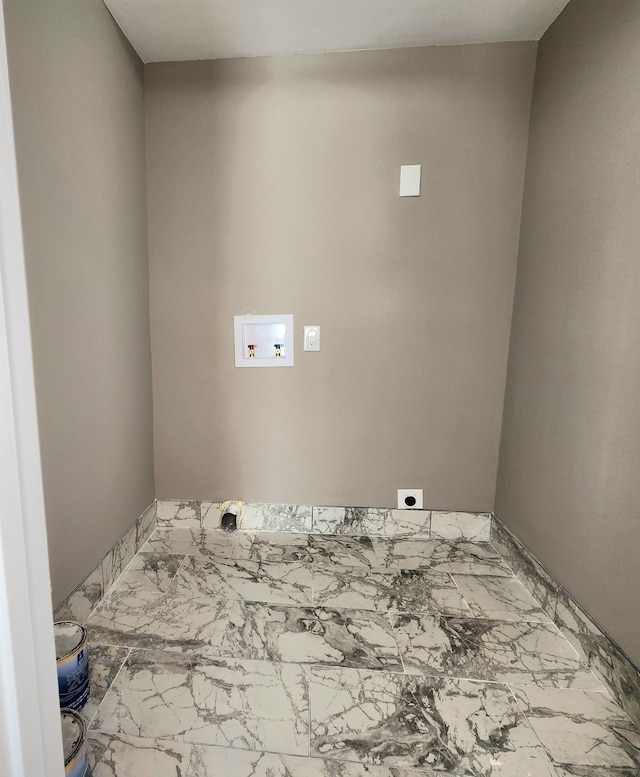 laundry room with hookup for an electric dryer, washer hookup, and tile floors