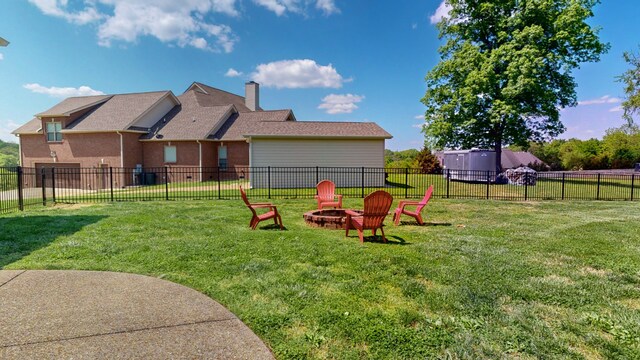 view of yard featuring a fire pit