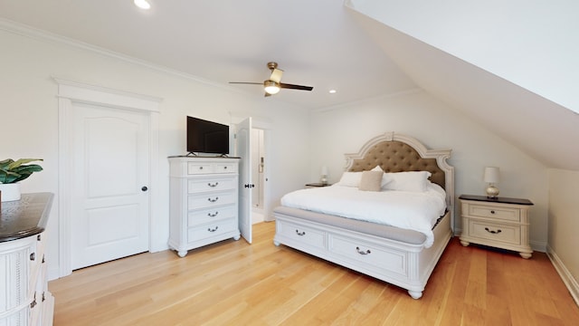 bedroom featuring lofted ceiling, ceiling fan, crown molding, and light wood-type flooring