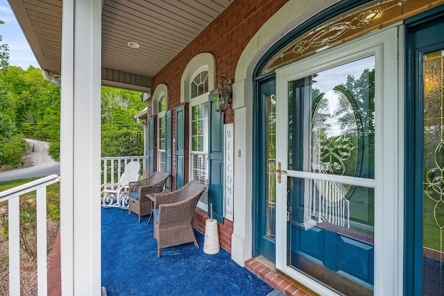 balcony featuring covered porch