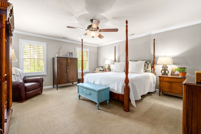 bedroom featuring ornamental molding, carpet, ceiling fan, and multiple windows