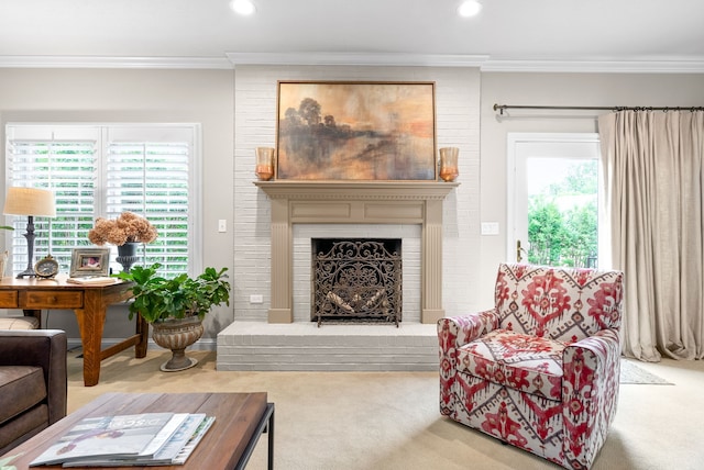 carpeted living room with a fireplace, crown molding, and brick wall