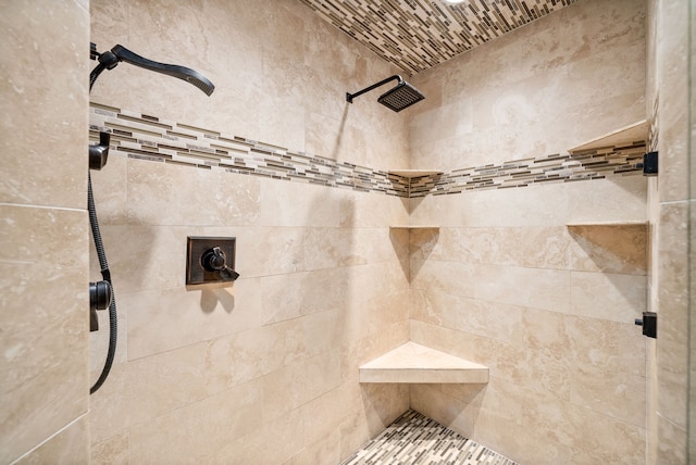 interior space featuring a tile shower