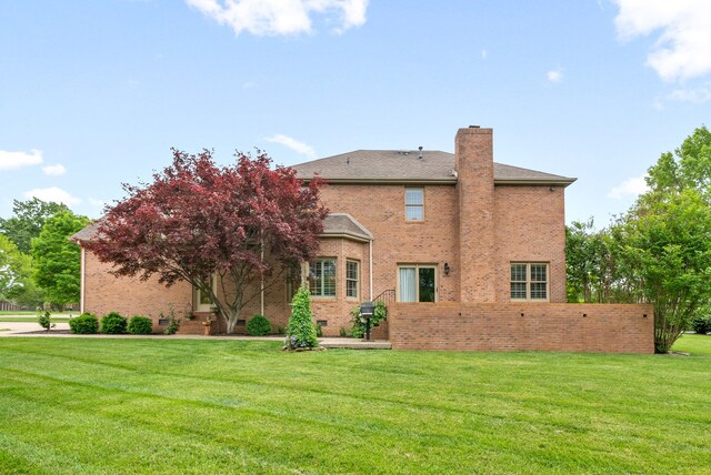 exterior space featuring a front lawn