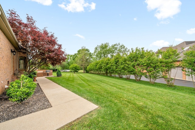 view of yard with a garage