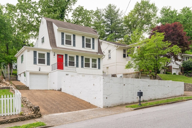 view of front of home with a garage