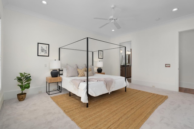 bedroom featuring carpet, ceiling fan, and crown molding