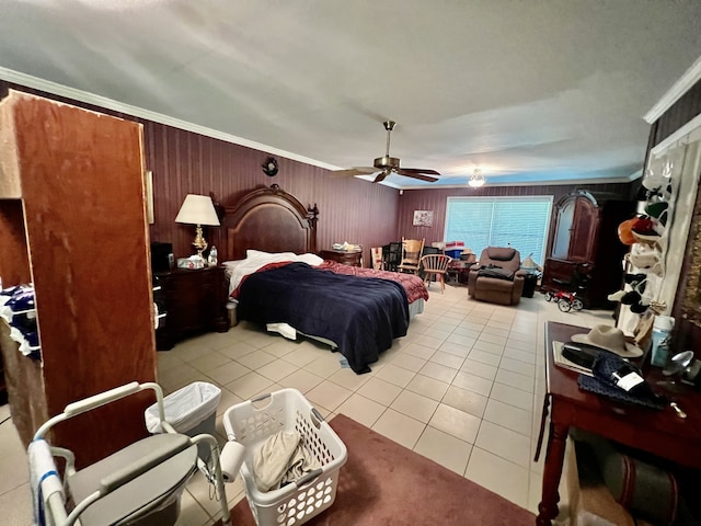 tiled bedroom featuring ceiling fan and crown molding