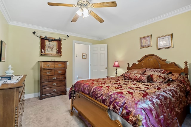 bedroom with ornamental molding, light colored carpet, and ceiling fan