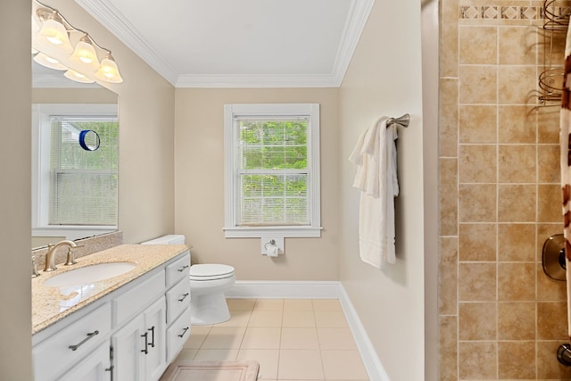 bathroom with tile patterned floors, vanity, crown molding, and toilet