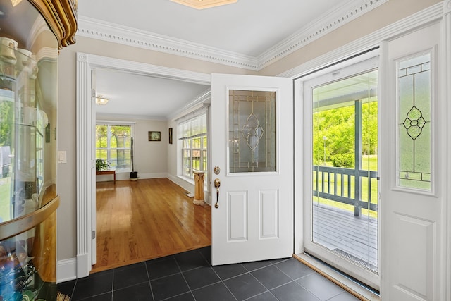 tiled entryway with crown molding