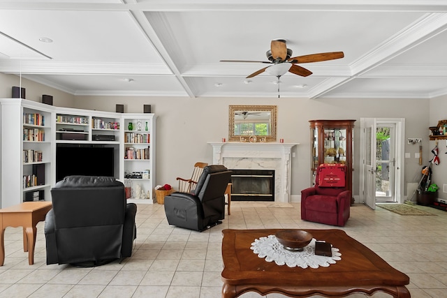 living room with light tile patterned floors, a wealth of natural light, and coffered ceiling