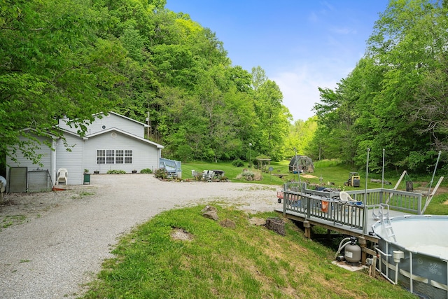 view of yard with a deck