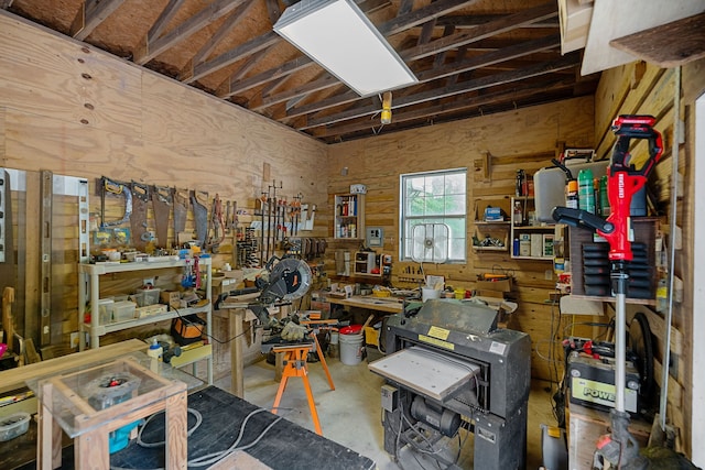 interior space featuring concrete floors and a workshop area