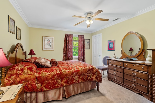 bedroom featuring ornamental molding, carpet floors, and ceiling fan