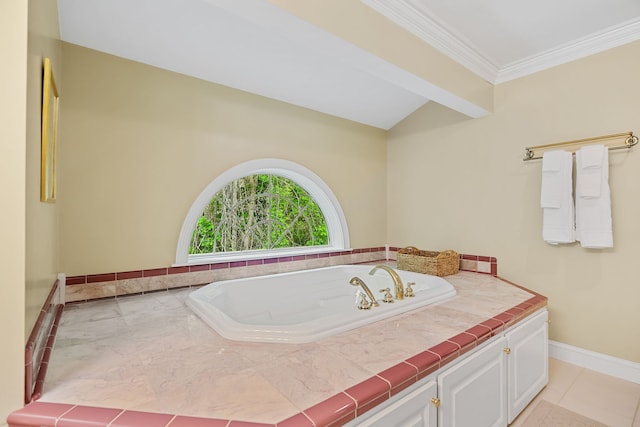 bathroom with vanity, ornamental molding, tile patterned floors, and a tub