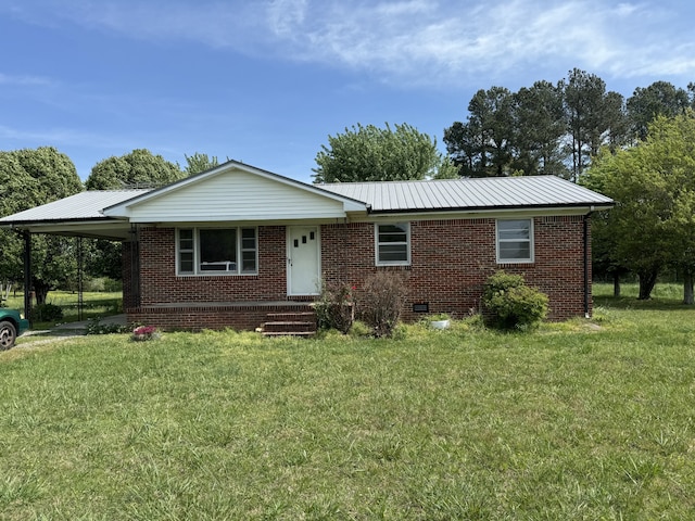 ranch-style house with a front lawn and a carport