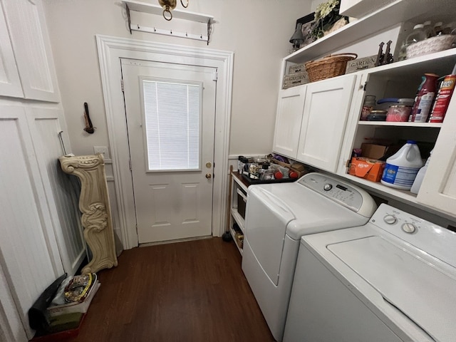 laundry room with cabinets, dark hardwood / wood-style flooring, and independent washer and dryer