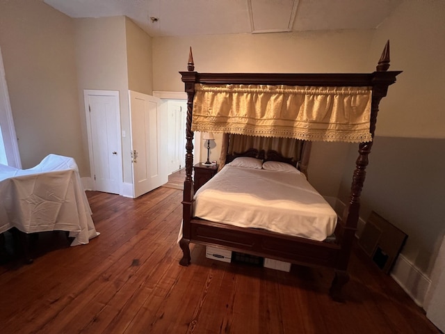 bedroom featuring wood-type flooring