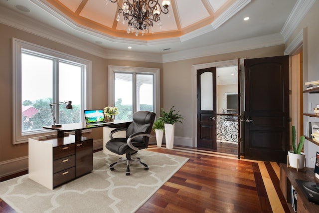 home office featuring plenty of natural light, crown molding, dark hardwood / wood-style floors, and a raised ceiling