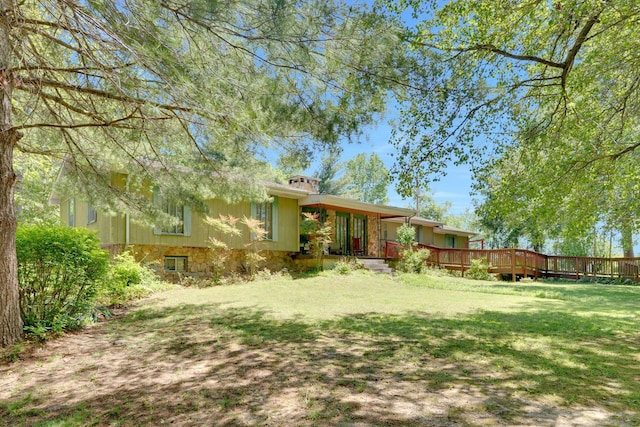 view of yard with a deck