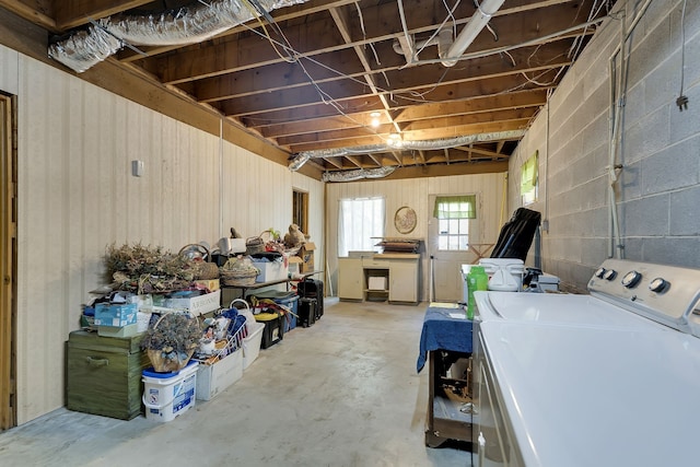 basement featuring washer and clothes dryer