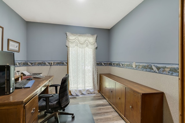 office space featuring light hardwood / wood-style floors