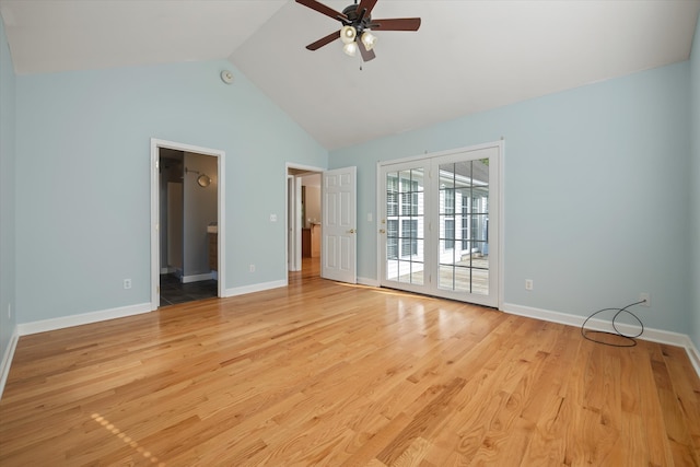 spare room with high vaulted ceiling, ceiling fan, and light tile flooring