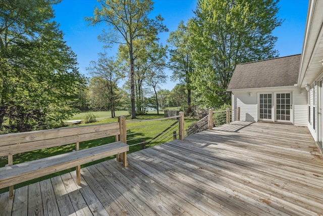 wooden deck with a yard