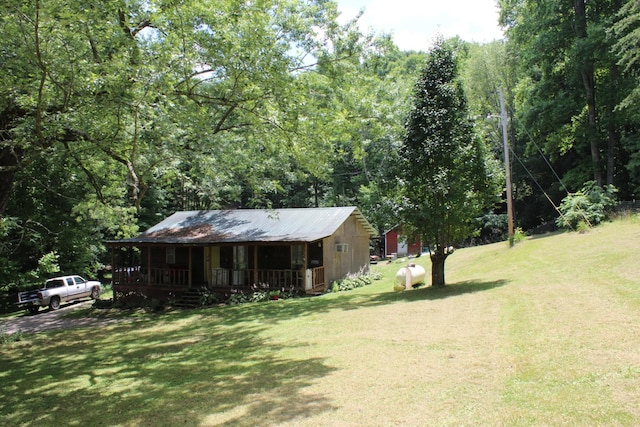 view of yard featuring a porch