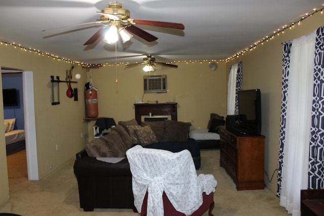 carpeted living room with a wall unit AC and ceiling fan