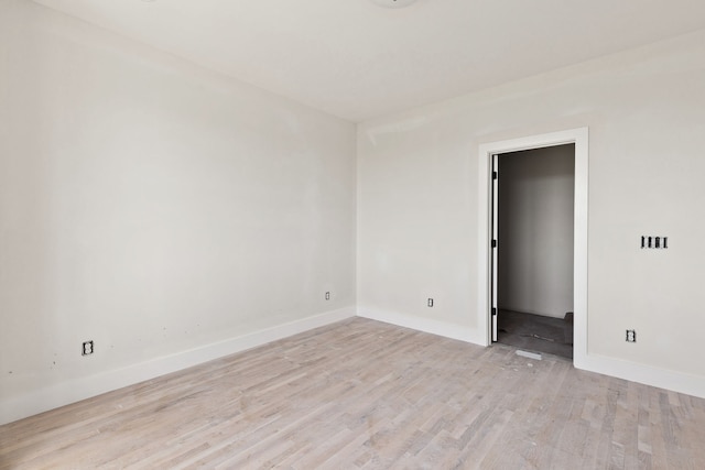 empty room with light wood-type flooring