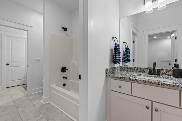 bathroom with marble finish floor, shower / tub combination, vanity, and baseboards