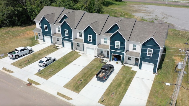 view of front of house featuring a garage and concrete driveway