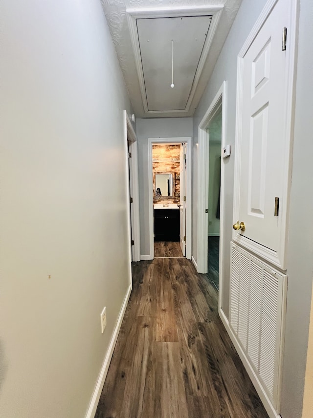 hall with dark hardwood / wood-style floors