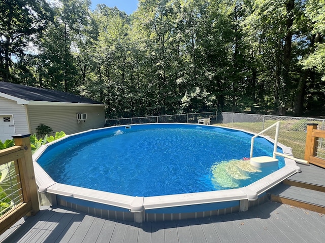 view of pool with a deck