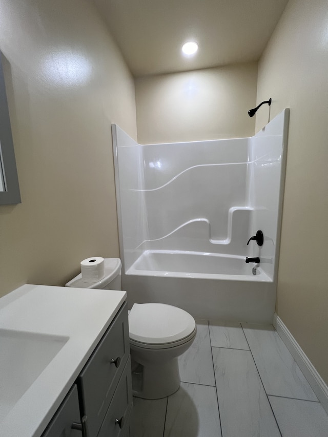 full bathroom with bathtub / shower combination, vanity, tile floors, and toilet