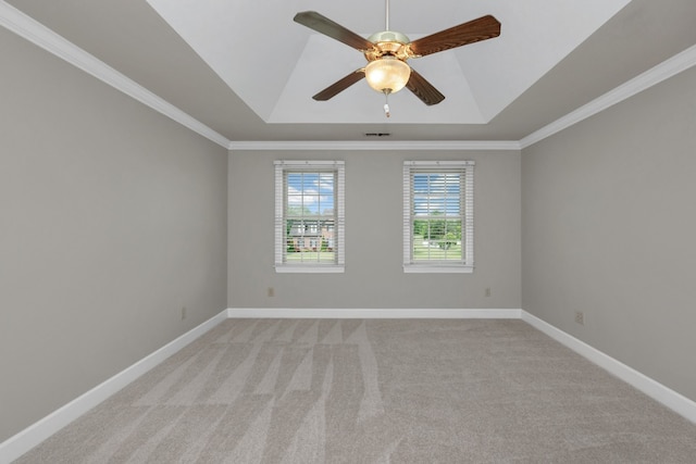 empty room with light colored carpet, ceiling fan, and crown molding