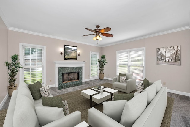 living room featuring dark colored carpet, plenty of natural light, and a fireplace