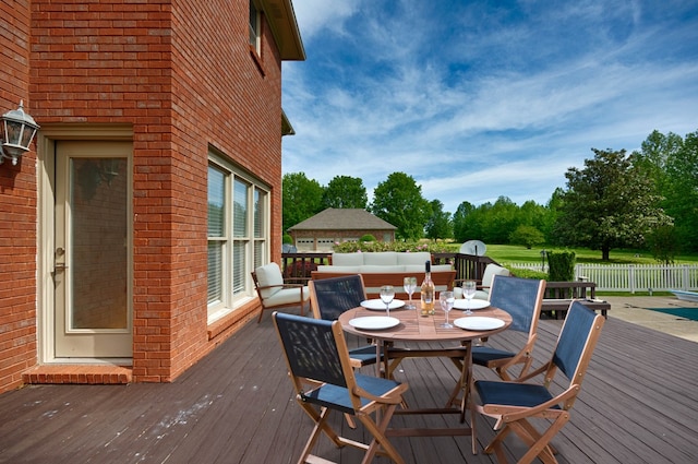 deck with outdoor lounge area