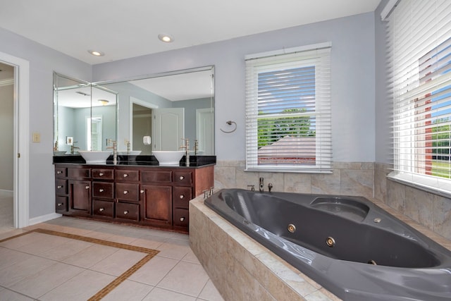 bathroom with a wealth of natural light, tile floors, and double sink vanity