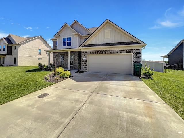 view of front of house with a front lawn and a garage