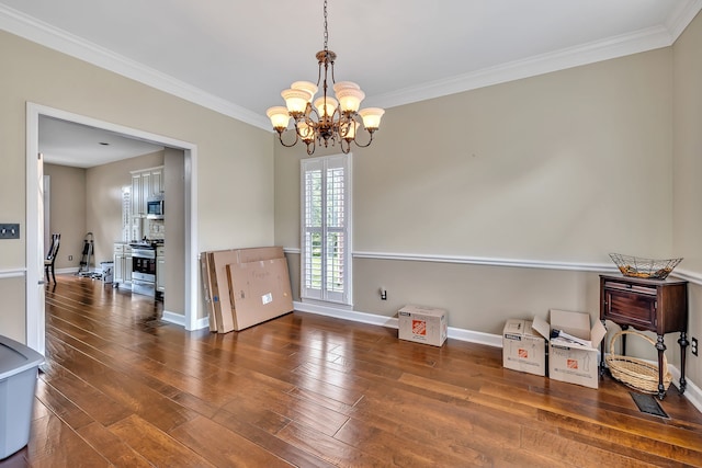 808 Seven Points Cv, Hermitage, TN 37076 - dining room featuring ornamental molding, dark hardwood / wood-style flooring, and an inviting chandelier