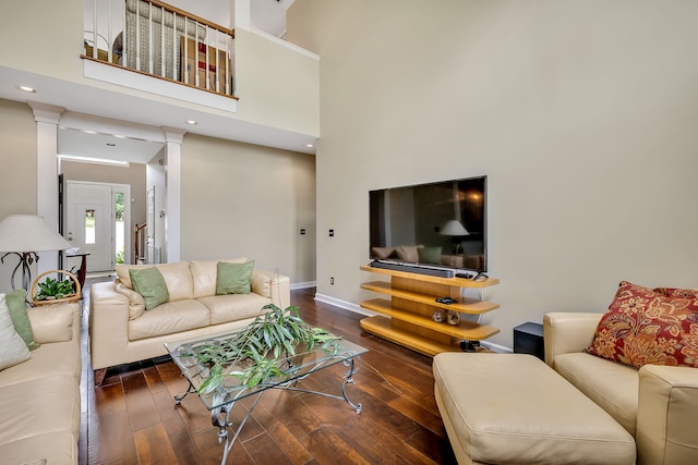 808 Seven Points Cv, Hermitage, TN 37076 - living room featuring a towering ceiling, dark wood-type flooring, and ornate columns