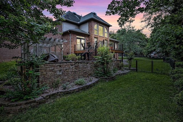 808 Seven Points Cv, Hermitage, TN 37076 - back house at dusk with a pergola, a deck, and a lawn