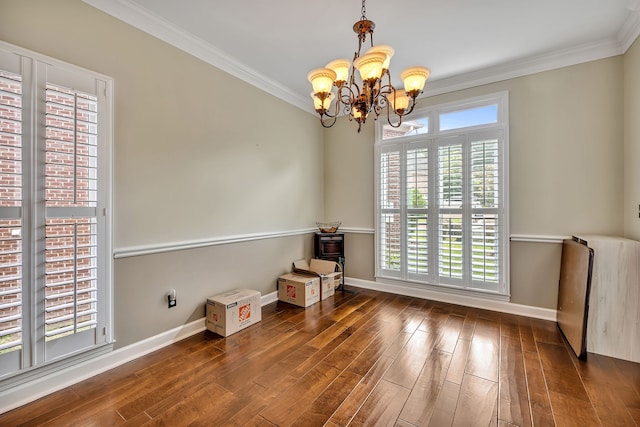 808 Seven Points Cv, Hermitage, TN 37076 - spare room with dark wood-type flooring, an inviting chandelier, and crown molding